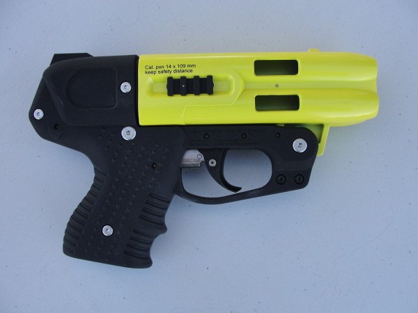 The Compact JPX4 is smaller in dimensions, and does not have the Picatinny rail or integrated laser.