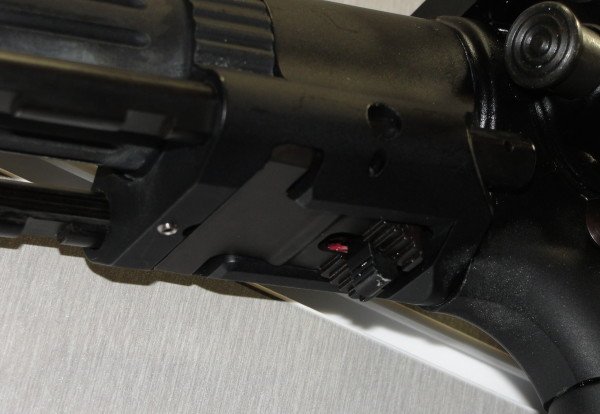 The release lever on the bottom side of the M7A1 CQB Stock housing.