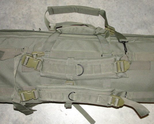 Here the backpack style shoulder straps and one of the carry handles are visible.